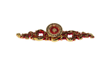 Decorative red and gold floral baroque ornament with intricate scrollwork design, photographed on clean white background, concept of luxury vintage