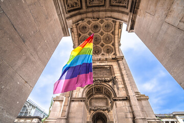 Brussels , Belgium. Triumphal Arch in Brussels scenic landmark view, LGBTQ flag
