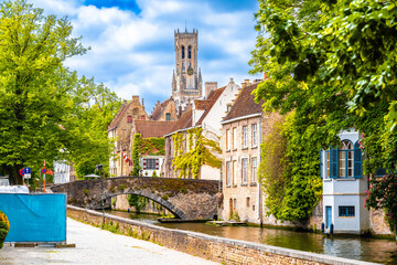 Bruges, Belgium.  Bruges water canal and historic bridge view, Brugge old town quarter,