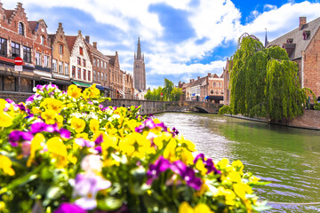 Bruges, Belgium.  Bruges water canal and historic bridge view, Brugge old town quarter,