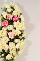 Still life with beautiful flowers of cream rose and rose hips on elegant modern table,Abstract flower arrangement. template for your design with place for text, minimalist beauty concept,