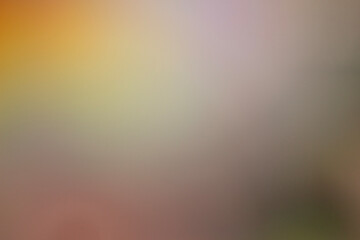 Blurred background with soft colors, creating an abstract and dreamy atmosphere. Mix of warm and cool tones, suggesting vibrant environment