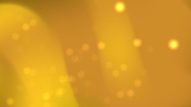 Blurred gold background with bokeh lights.