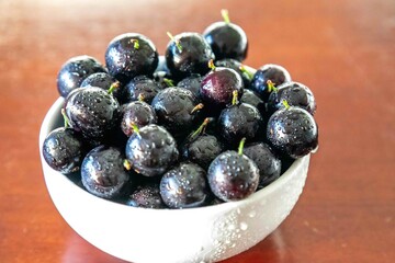Beautiful and juicy ripe jabuticaba fruits in fine detail