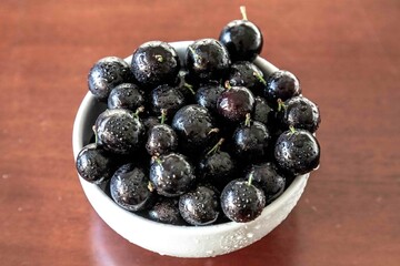 Beautiful and juicy ripe jabuticaba fruits in fine detail