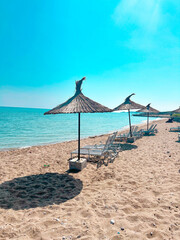 beach with umbrellas