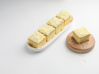 Vanilla sponge cheese cake on white background