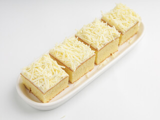 Vanilla sponge cheese cake on white background