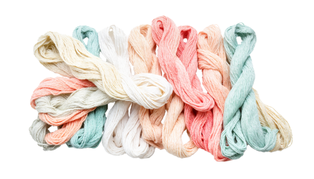 Bundle of pastel embroidery threads in soft shades isolated on white background