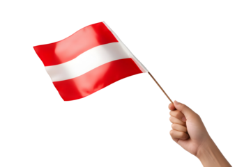 Patriotic display: Hand holding the Austrian flag waving against black backdrop