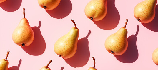 Yellow pears arranged in a diagonal pattern on a pink background with strong shadows.