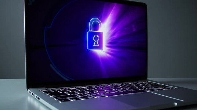 Digital lock symbol displayed on a laptop screen with vibrant neon colors showcasing data security in the virtual world.
