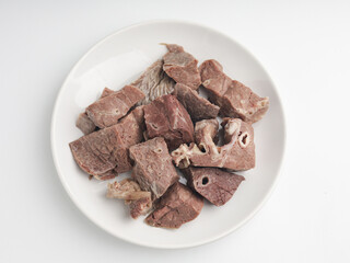 Boiled beef lungs on white plate