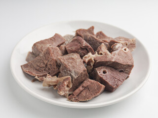 Boiled beef lungs on white plate