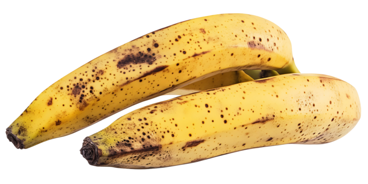 Ripe bananas isolated on black background, showcasing natural aging process, healthy fruit