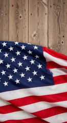 Obraz premium Close-Up of American Flag on Rustic Wooden Background for 4th of July Celebration and Patriotism