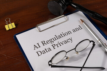AI Regulation and Data Privacy Document on Desk with Gavel – Technology Law and Digital Ethics...