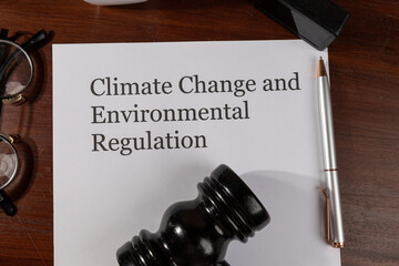 Climate Change and Environmental Regulation Document on Desk – Global Policy and Sustainability...