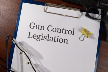 Gun Control Legislation Document on Desk – Firearm Policy and Legal Regulation Concept