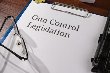 Gun Control Legislation Document on Desk – Firearm Policy and Legal Regulation Concept