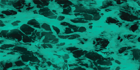 Abstract teal water surface with dark rocks a textured and graphic artistic representation of the ocean and coastal rock formations