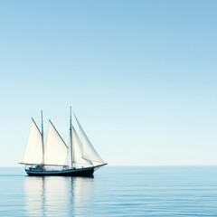 Sailboat gliding across calm ocean waters at dusk