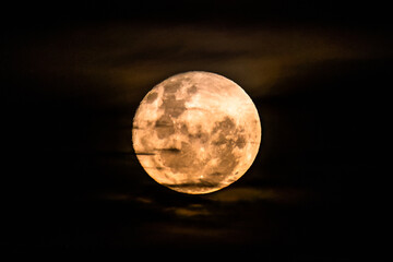 June's Full moon, Strawberry Moon with bands of clouds