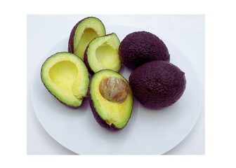 two whole raw avocado and four halves fresh avocadoes