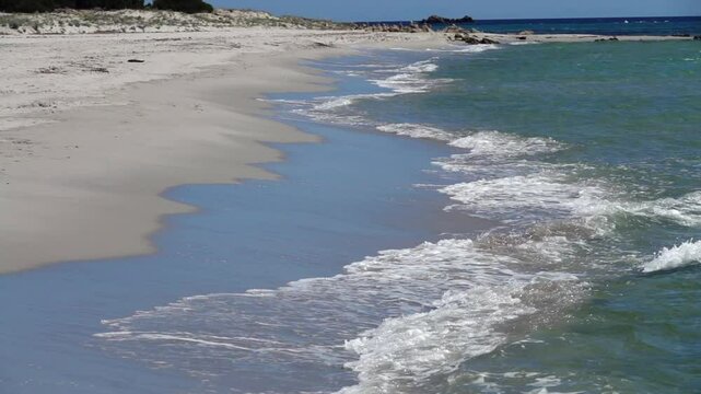 Pure and clear turquoise water of the Sardinian sea at Berchida beach south of Siniscola, in the Baronie territory on the east coast of the island of Sardinia, Italy