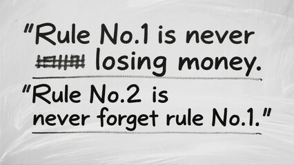 A white board with a quote on it that says "Rule No. 1 is Never Losing Money."