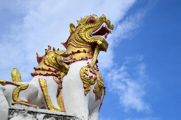 Statues of Lion Guarding temples, Symbols of Buddhism, Southeast Asia at Chiang Yuen temple, Mueang Chiang Mai, Chiang Mai, Northern Thailand