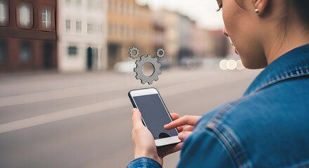 Smartphone User with Gear Icons in Urban Environment