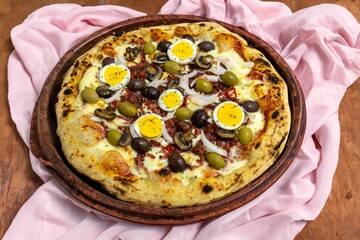 Original Brazilian pizza with olives, mushrooms, grated pepperoni, onion, red pepper, oregano and extra virgin olive oil