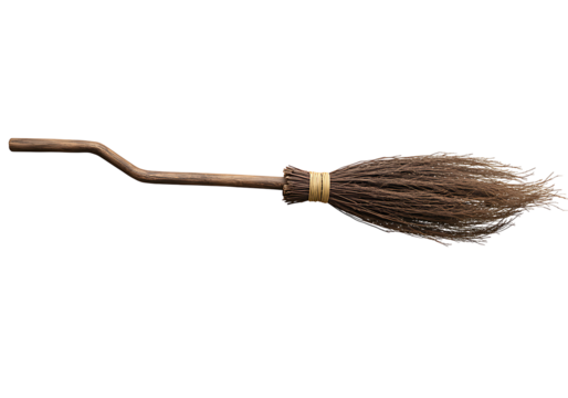 Brown broom on a black background Features a wooden handle straw bristles tied with string