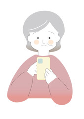 スマホを操作するシニア女性