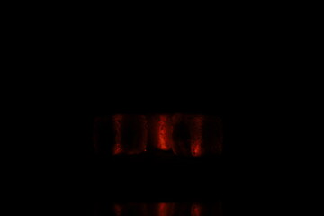 Glowing coals with glitch style lighting, enriched by noise, effect and grain details, create a...