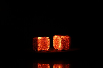 Glowing coals with glitch style lighting, enriched by noise, effect and grain details, create a...