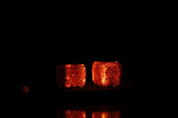 Glowing coals with glitch style lighting, enriched by noise, effect and grain details, create a...