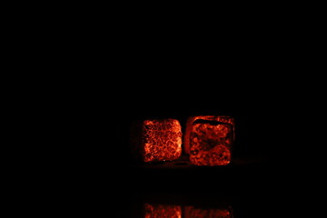 Glowing coals with glitch style lighting, enriched by noise, effect and grain details, create a...