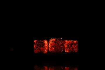 Glowing coals with glitch style lighting, enriched by noise, effect and grain details, create a...