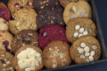 Assorted cookies in a wooden box.
