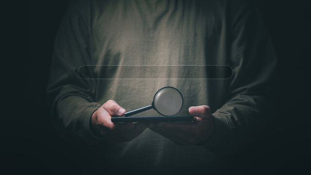 Information search technology, search engine optimization, male hand using a smartphone to search information, using the search bar function on your website