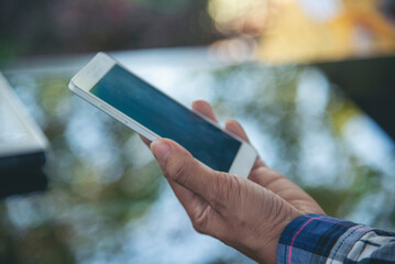 Business woman using smartphone shopping online, call, texting message internet technology lifestyle. Asian woman using cellphone walking on city street. Smart phone smart confident woman modern city