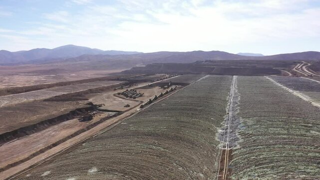 Leaching Area in Copper Mining Operation &ndash; Heap Pads, Acid Ponds, Stackers and Conveyor Belts in the Atacama Desert

