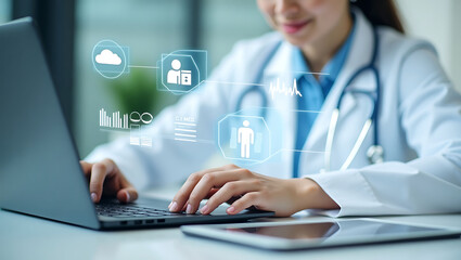 Doctor using laptop with digital medical interface