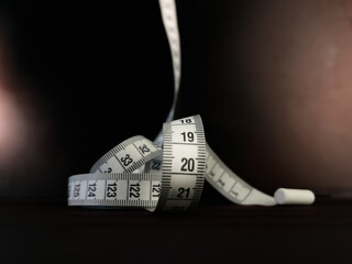 High-quality photo of a basic sewing ruler, isolated on a white background. Perfect for tailors,...