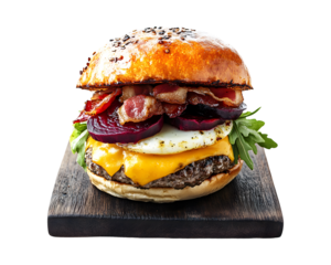 Delicious gourmet beef burger with bacon cheese beetroot and arugula on wooden board isolated on transparent background
