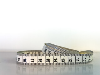 High-quality photo of a colorful sewing ruler, isolated and eye-catching. Ideal for creative professionals looking for a stylish and precise measuring tool.