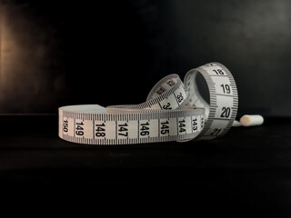 A high-quality photo of a multifunction sewing ruler, isolated on a clean background. This...