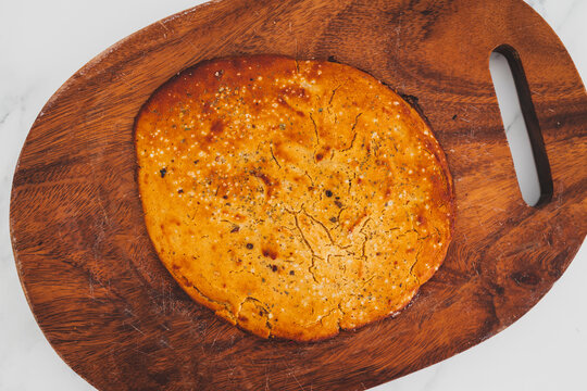 homemade socca chickpea flatbread inspired by southern french recipe, rustic cooking